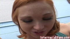 Redhead babe Kristina strokes a huge black cock Thumb