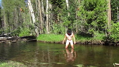 Bathing naked in the creek. Thumb