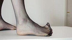 Feet in Pantyhose Thumb